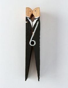 a pair of scissors that have been cut in half to look like they are being held together