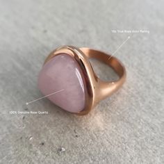 This Rose Quartz Ring is the perfect accessory for those looking to bring a little extra positivity and self-love into their daily lives. Made from durable Stainless Steel and plated with 18k Rose Gold, this boho-style ring is not only beautiful but also built to last.  Rose Quartz Ring b Asana Crystals is the perfect accessory. The stunning crystal adds a touch of elegance and sophistication to any outfit, while the boho-style band keeps it casual and versatile.

 

 	Size: 7 
 	Free Shipping 2 Days
 	Authentic Stone: Rose Quartz
 	18k Gold Plated Bohemian Rose Gold Rings As Gift, Bohemian Rose Gold Rings For Gift, Adjustable Rose Quartz Rose Gold Ring, Rose Gold Rings With Rose Quartz For Gifts, Rose Gold Rose Quartz Promise Ring, Rose Gold Open Crystal Ring For Everyday, Rose Gold Rose Quartz Ring, Rose Quartz Rings, Rose Quartz Color