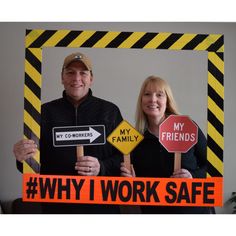 a man and woman holding up signs with the words why i work safe on them