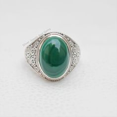 Gemstone-Malachite Shape-Oval Stone Size- 10x14 MM Metal-925 Sterling Silver This One of a kind ring is adorned with beautiful rich green color Malachite Gemstone set in sterling silver band. Malachite is the birthstone associated with the Scorpio,zodiac sign About gemstone- Malachite is vibrant green color stone which can bring transformation by assisting one in changing situations..The green color of this stone is the color of abundance of spirit and prosperity.Malachite act as guardian of the Taurus Birthstone, Birthstone Promise Rings, Scorpio Zodiac Sign, Malachite Ring, Malachite Rings, Handmade Silver Ring, Scorpio Zodiac, Rich Green, Color Stone