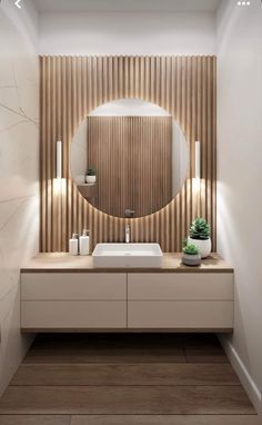 a bathroom with a sink, mirror and wooden paneled wall in the middle of it