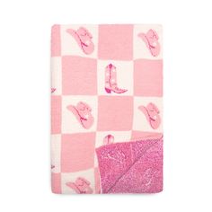 On a white background is a folded pink and white checkered blanket with alternating pink cowgirl hats and cowgirl boots in each white square. Checker Blanket, Cowgirl Room, Fuzzy Blanket, Pink Blanket, Boots Patterns, Checker Print, White Blanket, Cozy Throws, Soft Blankets