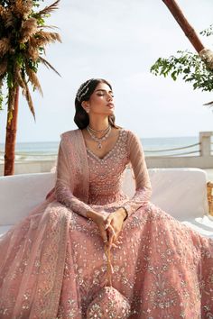 • Fully hand-worked, embroidered And sequined net bodice for front• Embroidered And sequined net bodice for back• Embroidered And sequined net sleeves• Embroidered And sequined net border for sleeves• Fully hand-worked, embroidered And sequined net panels for lehnga• Embroidered And sequined net border for lehnga panels• Embroidered And sequined net dupatta• Embroidered And sequined net motifs for dupatta corners• Embroidered And sequined net border for dupatta• Dyed inner fabric for bodice• Dye Glamorous Dresses With Resham Embroidery, Glamorous Organza Dress With Resham Embroidery, Pearl Embroidered Semi-stitched Gown, Designer Net Dress With Mirror Work, Eid Gown With Sequins And Fitted Design, Embellished Net Dress For Eid, Semi-stitched Net Dress With Mirror Work, Glamorous Embellished Gown For Eid, Semi-stitched Sequin Net Dress