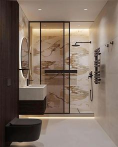 a modern bathroom with marble walls and flooring