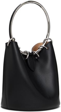 Buffed calfskin top handle bag in black. · O-rings at fixed metal carry handle · Logo stamp at face · Magnetic closure · Detachable zip pouch at interior · Calfskin suede lining · H8 x W7.25 x D7.25 Supplier color: Noir Modern Top Handle Bucket Bag With Metal Hardware, Modern Bucket Bag With Top Handle And Metal Hardware, Modern Handheld Bags With Metal Hardware, Black Bucket Bag With Top Handle And Metal Hardware, Modern Formal Bucket Bag With Metal Hardware, Formal Top Handle Bucket Bag With Metal Hardware, Modern Bucket Bag With Silver-tone Hardware, Modern Formal Bucket Bag With Silver-tone Hardware, Modern Evening Bucket Bag With Metal Hardware