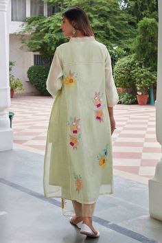 Mint green three fourth sleeves A-line kurta in chanderi cotton base with flora garden patch work, cut work detailing, V neckline and embroidered sleeves hem. Paired with straight organza pant. - Aza Fashions Garden Patch, Kurta Pant Set, Cotton Blossom, A Line Kurta, Patch Work, Kurta With Pants, Cotton Embroidery, Cut Work, Aza Fashion