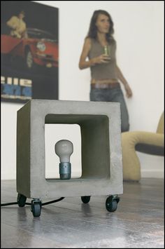 a cement cube with a light bulb in it