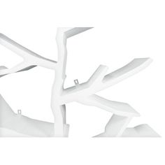 an abstract white sculpture is shown against a white background