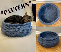 a cat laying in a blue crochet basket on top of a bed next to pillows