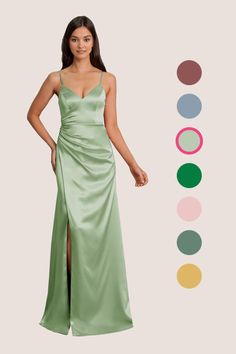 a woman in a long green dress standing next to an assortment of color swatches