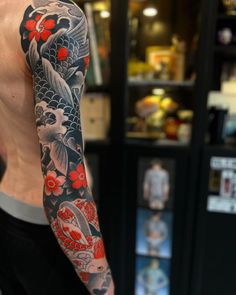 a man with a tattoo on his arm