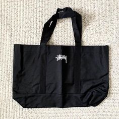 Stussy Black Tote Shoulder Handbag Bag Brand New No Tag Seal In Package 100% Authentic Size: 20” (W) X 14” (H) Stussy X Japanese Magazine Exclusive Product Ship Within 24 Hours Final Sale Check Out My Other Items In My Closet: Bape, Baby Milo, Stussy, Marc Jacobs, Sanrio, Hello Kitty, My Melody, Kuromi And All The Kawaii Stuffs That I Found In Japan. Black Casual Bags For Errands, Casual Black Bags For Errands, Black Tote Bag For Errands, Black Bags With Top Carry Handle For Errands, Black Bag With Top Carry Handle For Errands, Trendy Black Canvas Bag For Errands, Large Black Bag With Top Carry Handle, Black Canvas Bag With Dust Bag For Errands, Black Tote Bag With Zipper Pocket