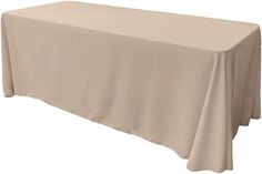 a table covered with a beige cloth