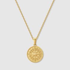 Our North Star Compass necklace is made from Premium quality 316L stainless steel. This allows the pendant and chain to be water and sweat resistant. This chain can be worn on its own as a statement or be layered with other chains from our shop.◈ Chain Length: 20 Inches◈ Chain Width: 1.5 MM◈ Chain Color : Gold◈ Chain Style: Flat cable◈ Pendant Size: 20mm x 20mm x 3mm◈ Chain Quality: 316L stainless steel with PVD vacuum 18K gold plating◈ Chain Clasp: Lobster◈ Model is male, 5'10 & size medium◈ Hy Gold Compass Design Necklace In Stainless Steel, Gold Stainless Steel Compass Necklace, Gold Stainless Steel Necklace With Compass Design, Gold Compass Necklace, Compass Necklace Silver, Compass Necklace, North Star, Gold Plated Chains, Steel Jewelry