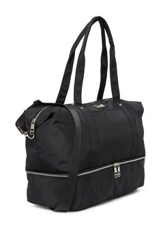 Stay stylish when traveling. The roomy interior of this Madden Girl weekend bag fits some of your favorite outfits and toiletries. . Dual top handles. Detachable, adjustable shoulder strap. Top zip closure. Exterior features slip pockets and bottom zip pocket. Interior features media pockets and zip wall pocket. Approx. 11" H x 19" W x 9.5" D. Approx. 12" handle drop, 19-30" strap drop . Imported Textile exterior and lining Trendy Tote Gym Bag With Zipper Closure, Trendy Travel Satchel With Zipper Closure, Trendy Weekender Bag With Zipper And Double Handle, Zipper Closure Duffle Bag For On-the-go, Trendy Gym Bag For Travel, Trendy Weekender Bag With Zipper, Modern Shoulder Bag For Overnight Trips, Modern Shoulder Bag With Zipper For Overnight Trips, Black Travel Bag With Zipper And Double Handle