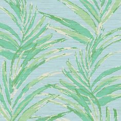 a blue and green wallpaper with palm leaves