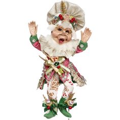 a figurine that is wearing a chef's hat and holding his arms in the air