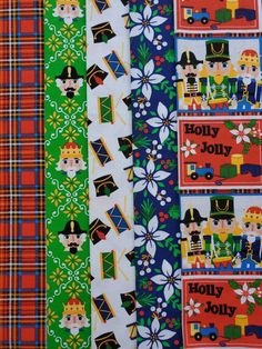 several different colored fabric with pictures of people and trucks on them, all in various patterns