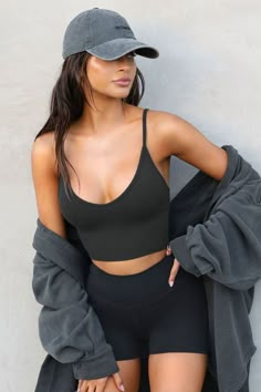 SPAGHETTI STRAP CROPPED TANK WITH A U-NECKLINE. OUR FLEXRIB FABRIC WAS DESIGNED WITH COMFORT IN MIND. IT'S SOFT, STRETCHY AND MADE TO MOVE WITH YOU. YOU'LL WANT TO WEAR IT ALL DAY, EVERY DAY. COLOR: ﻿VINTAGE BLACK / PEARL GREY SIZING: X/S (0-2), S/M (4-6), M/L (8-10) MODEL IS 5'8" AND WEARING SIZE X/S FABRIC: 90% RAYON, 10% SPANDEX CARE: MACHINE WASH COLD WITH LIKE COLORS. CARE: LAY FLAT TO DRY. Form Fitting Tops, Joah Brown, Gym Fits, Athleisure Outfits, Outfits Casuales, Comfy Outfits, Look Cool, Gym Outfit, Crop Tank