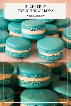 blueberry french macarons are stacked on top of each other