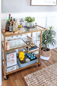 a bar cart with drinks on it in a room