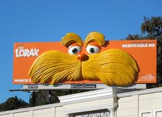 the lorax movie billboard on top of a building