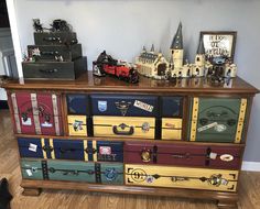 a dresser with many different colored drawers on it