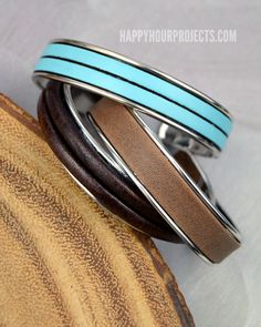 three different colored rings sitting on top of each other