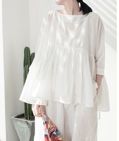 "Pure Linen Shirt For Summer Linen Blouse For Women, Puff Sleeves Linen Top Casual Loose Linen White Tops Plus Size Clothing SIZE LIST: Lenght:64CM/25.1\" Bust:130CM/51.1\" Shipping Policies: All orders will take the fastest express delivery no extra shipping. Usually 10-15 days to arrive US. To Europe usually 10-20 days. Other countries usually 10-15 days. Safe and quick. This is washing instructions: Suitable for hand wash or machine washing softly Do not bleach Iron on low heat PCE dry cleaning available Tumble dry with low heat Return Policy Kindly cntact us for returning address. You can return the item to my address. When we receive the item may refund for the price of items. Thank you for your love:-)" Plain Blouse For Spring, Summer Cotton Smock Blouse, Long Sleeve Summer Peasant Top For Workwear, Casual Smock Blouse With Lantern Sleeves, Daywear Padded Blouse With Lantern Sleeves, Cotton Smock Tops For Workwear, Daywear Padded Lantern Sleeve Top, Padded Lantern Sleeve Blouse For Daywear, Relaxed Fit Spring Blouse