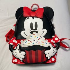 Brand New!!! Still Has Tags And Stuffing. Trendy Red Bags For Disney Trips, Casual Red Bag For Disney Fan Events, Cute Bags For Disney Trips, Black Backpack For Theme Park, Cute Red Bag For Disney Trips, Cute Red Backpack For Disney Trips, Black Character Backpack For Everyday Use, Black Disney Style Bag For Theme Park, Minnie Mouse Backpack For Disney Fan Events