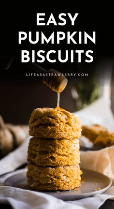 a stack of pumpkin biscuits on a plate with the words easy pumpkin biscuits