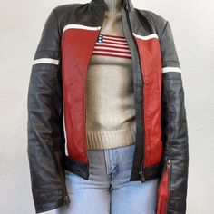 Rev up your style with a vintage motorcycle jacket from Highway Ave, your premier destination for timeless fashion. This iconic piece of history is $160. Our online vintage thrift store offers you the chance to embrace the rugged charm of yesteryears while making a bold statement in the present. Crafted with genuine leather, this jacket exudes character and durability, a testament to its enduring style. Don't let this vintage motorcycle jacket escape your grasp. Fitted Patchwork Leather Jacket, Retro Fitted Biker Jacket For Spring, Fitted Leather Jacket With Patchwork, Fitted Patchwork Leather Jacket With Long Sleeves, Retro Fitted Biker Jacket For Fall, Fitted Retro Leather Jacket For Fall, Retro Fitted Leather Jacket For Fall, Retro Fitted Biker Jacket With Long Sleeves, Retro Fitted Long Sleeve Biker Jacket