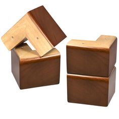 two wooden boxes sitting on top of each other