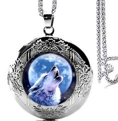 Silver Tone Wolf Howling at the Moon Locket Pendant Necklace Glass Cabochon Art Picture This Beautiful Wolf Necklace Made from Zinc Alloy and Rhodium Plated to make it look Beautiful and Comfortable to Wear The Locket Pendant is 1.25 Inch in Diameter the Stainless Steel Chain is 24" Gift Boxed. Will make an amazing Gift ! Shipping is Fast and Free . We ship by First Class Mail with tracking number.  Thank you for looking ! Silver Moon-shaped Locket Jewelry, Collectible Round Pendant With Moon Charm, Silver Necklaces With Moon Charm, Adjustable Round Metal Locket Necklace, Moon Locket, Wolf Howling At The Moon, Beautiful Wolf, Howling At The Moon, Wolf Necklace