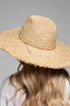 NON-ELIGIBLE FOR RETURN. FINAL SALE This Farmer's Market Woven Raffia Sun Hat blocks the sun while you purchase fresh organic finds. This sun hat features woven raffia, an internal adjustable strap, and frayed details. Sun Hat Raffia Weaving Fray Accents Inner adjustable Strap Composition: Raffia + Paper Circumference: 22.5" Brim: 5" Crown height: 4" One size fits most Raffia Weaving, Raffia Sun Hat, Flower Kimono, Distressed Baseball Cap, Hat Blocks, Crown Heights, Straw Sun Hat, Woven Raffia, Visor Hats