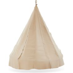 a beige tent hanging from a hook on a white wall