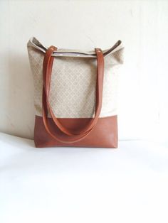 Leather tote linen tote geometric print tote bag  by allbyFEDI $48 Modern Brown Rectangular Canvas Bag, Modern Brown Canvas Bag With Double Handle, Modern Brown Satchel Canvas Bag, Modern Brown Canvas Satchel Bag, Brown Square Canvas Bag With Leather Handles, Brown Tote Bag With Canvas Lining, Brown Square Canvas Bag, Square Brown Canvas Bag, Rectangular Brown Canvas Bag With Leather Handles