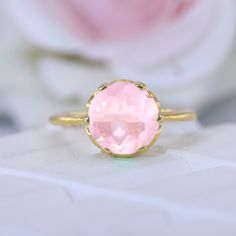 Vintage Rose Quartz Promise Ring Art Deco Bridesmaid Jewelry Pink Gemstone Ring Delicate Women Stacking Ring 14k Yellow Gold Engagement Ring Maine Stone - Rose Quartz Stone Creation - Lab Created Stone Shape - Round Stone Color - Pink Stone Size - 8 MM Birthstone - July Features: * Handmade * Ready To Ship * Brand New * All Ring Sizes Available * Suitable For Every Day * 14k Solid Gold / 18k Solid Gold / Gold Filled Over Sterling Silver * Purity Stamped * Fits True to Size * High Quality * Avail Rose Gold Gemstone Birthstone Ring As Gift, Dainty Pink Solitaire Ring, Pink Gemstone Stackable Rings In 14k Gold, Elegant Pink Birthstone Ring For Promise, Rose Colored Fine Jewelry Ring As A Gift, Elegant Pink Birthstone Promise Ring, 14k Gold Pink Solitaire Jewelry, Pink Solitaire Round Jewelry, Pink Round Solitaire Jewelry