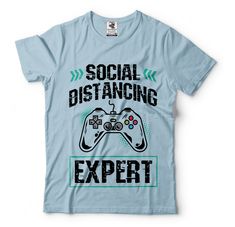 "Gaming T-Shirt Gift For Gamer Funny Gaming Social Distancing T-Shirt This ULTRA COTTON UNISEX T-shirt is made of Pre-shrunk 100% cotton, 6.1-ounce. * Seamless double-needle 7/8\" collar, Double-needle sleeves and hem, Taped neck and shoulders Our T Shirts and Hoodies are Printed by advanced technology Digital Printer on 100% Ultra Cotton tees and hoodies . We use waterbased textile ink, Safest ink type for everyone. Each T shirt is Made individually and double checked for quality before sending Gamer Style Cotton T-shirt With Logo Print, Pre-shrunk Cotton Gamer T-shirt, Gamer Style Cotton T-shirt With Screen Print, Gamer Cotton T-shirt Pre-shrunk, Gamer Style Cotton T-shirt With Letter Print, White Cotton Gamer T-shirt, Gamer Cotton T-shirt With Logo Print, Pop Pop Shirts, Console Gaming