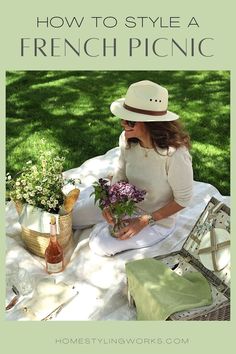 Woman in fedora holding lilacs, on picnic blanket with picnic basket, straw bag with baguette and daisy flowers, bottle of rose wine and glasses outdoors Picnic Must Haves, Picnic Dessert Ideas, Bestie Dates, Paris Apartment Decor, Charcuterie Picnic, Picnic Wine, French Picnic, Paris Garden, Wine Picnic