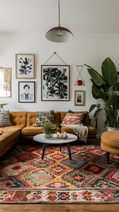 a living room filled with lots of furniture and pictures on the wall above it's coffee table