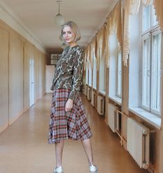 "Plaid full skirts are fabulous warm clothing for Fall and Winter. This pleated wool A-line skirt has pockets! The brown and orange give this plaid a fun touch. Orange is a great color for dreary days.  You'll love the high natural waist of this timeless 1960s tartan plaid skirt. The skirt is lined so no itch factor here, and it has a metal zipper, hook, and eye and snaps closures.  Have fun styling this from a traditional academic preppy style to cottage core folklore or take it punk... why not Fall Daywear Flared Skirt, Fall Pleated Flared Skirt With Pockets, Fall Flared Pleated Skirt With Pockets, Fall Pleated Skirt With Pockets, Full Skirt For Fall Daywear, Fall Daywear Skirt With Pockets, Fall Full Pleated Skirt With Pockets, Fall Daywear Midi Skirt, Fall Pleated Full Skirt With Pockets