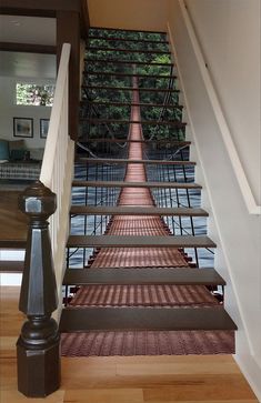 an image of stairs going up to the top floor in a house or office building