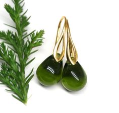 "Dark olive green glass drop earrings. You can choose: - regular hook ear wires - leverback Finish of earwires: - sterling silver 925 - 24K gold coated silver - black rhodium coated silver - 18K rose gold coated silver * Total length of earrings is 28mm (1.1\") * Weight of each earring is about 2,2-2,4gr. Due to it is glass there can be bubbles inside teardrops. You will get earrings in gift box. If you buy more than 1 pair I will pack them all in one box.  If you need separate packaging for eac Green Drop Teardrop Earrings For Formal, Green Teardrop Earrings For Formal Occasions, Green French Hook Earrings, Formal Green Teardrop Drop Earrings, Elegant Green Hypoallergenic Teardrop Earrings, Green Teardrop Earrings With Ear Wire For Gift, Olivine Jewelry, Dark Blue Earrings, Glass Drop Earrings