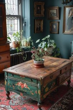 a living room filled with furniture and lots of plants