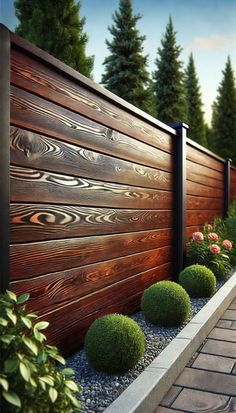 a wooden fence surrounded by plants and rocks