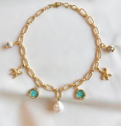 Capture the carefree and relaxed feeling of a day at the beach with our freshwater pearl charm necklace. Gold-filled charms of starfish, baby blue sea glass and merry-go-round pendants on a golden rope style chain add a laid-back luxury of coastal living. The large freshwater pearl adds a hint of sophistication making this necklace a perfect companion for breezy days and beachy nights. *Note: pearls may vary in size Size: 16 inches with a 1 inch extender Pearl Charm Necklace, Beachy Vibes, Stacked Necklaces, Blue Sea Glass, Bold Jewelry, Merry Go Round, Pearl Charms, Dream Jewelry, Round Pendant