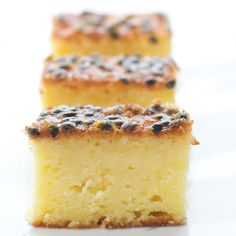 two pieces of cake sitting on top of a white table