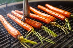 carrots being grilled on an outdoor grill