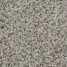 an image of a carpet texture that is very soft and light gray color with some small patches on it